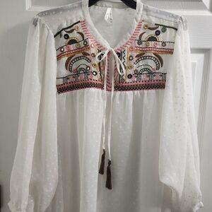 Boho peasant blouse with tassel tie.